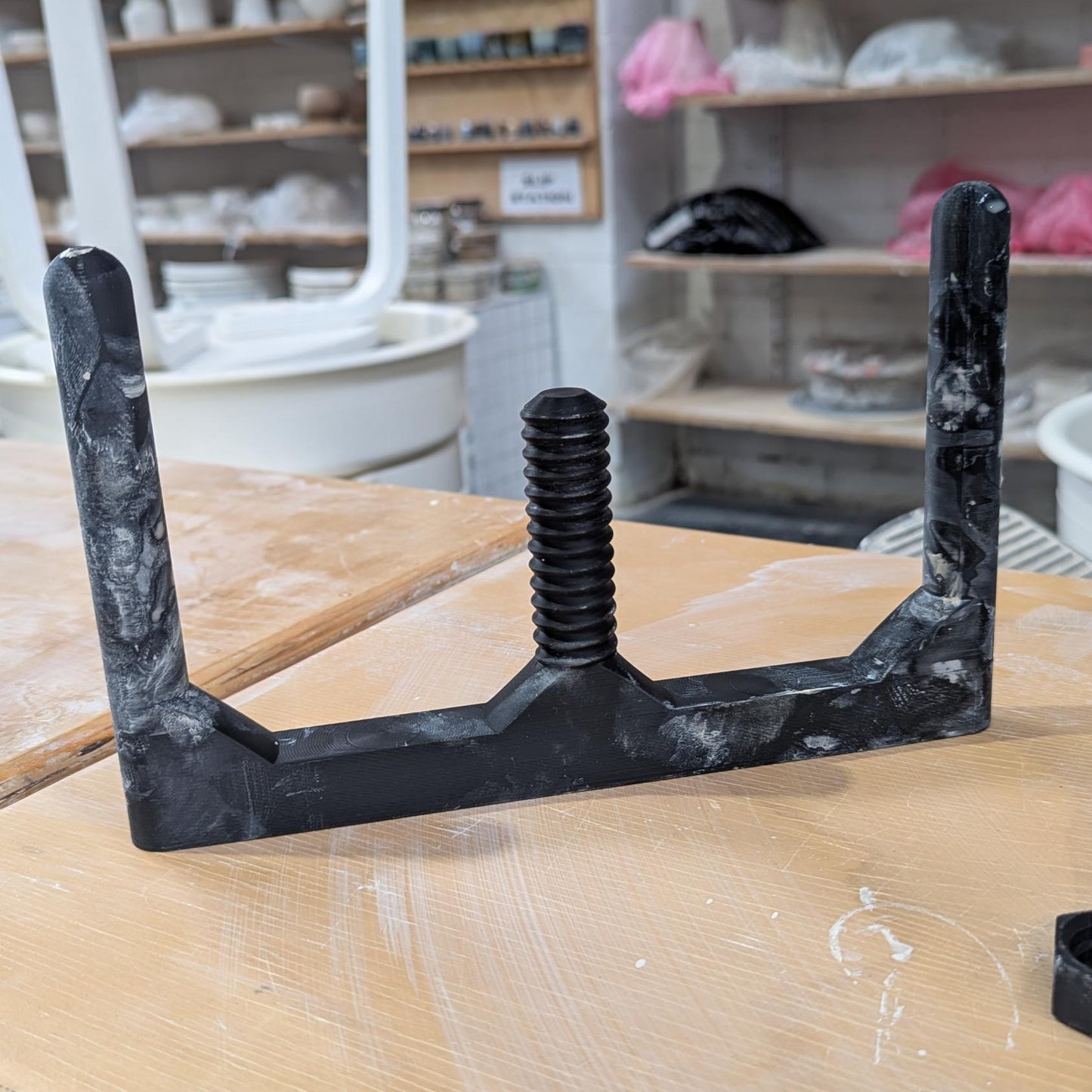 Pottery base setting tool with a 0-40mm adjustable range. Pottery accessibility aid, and an essential beginners pottery tool.